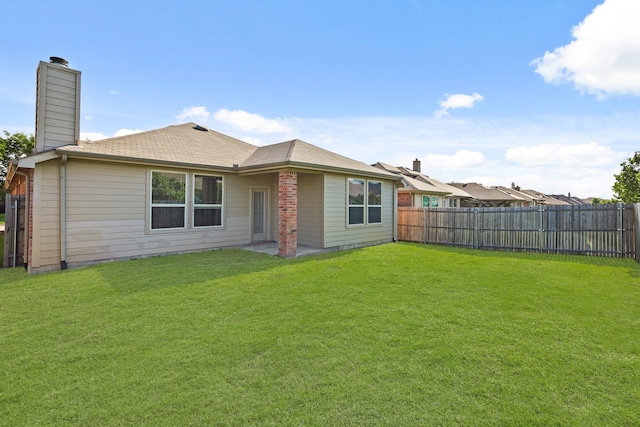 2004 Uvalde Dr, Forney, TX 75126 - rear view of house featuring a chimney