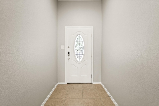 2004 Uvalde Dr, Forney, TX 75126 - doorway featuring baseboards and light tile patterned floors