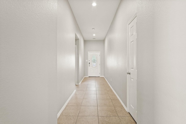 2004 Uvalde Dr, Forney, TX 75126 - corridor featuring light tile patterned floors, baseboards, and recessed lighting