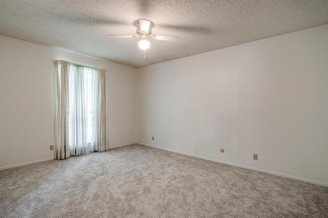 6417 Winifred Dr, Fort Worth, TX 76133 - unfurnished room featuring carpet floors, ceiling fan, and a textured ceiling
