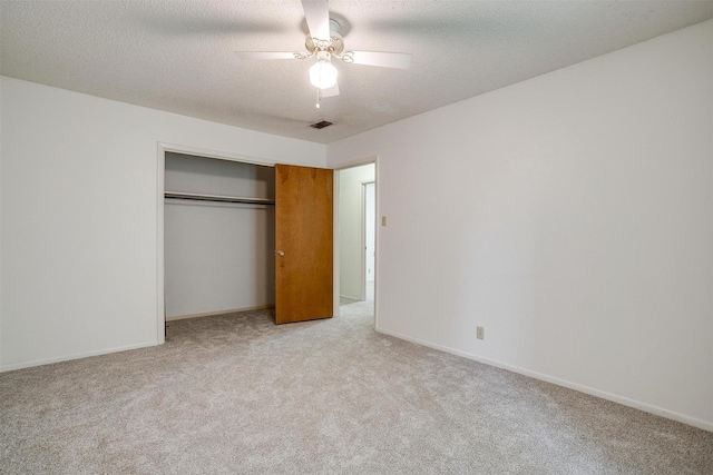 6417 Winifred Dr, Fort Worth, TX 76133 - unfurnished bedroom with light carpet, a closet, a textured ceiling, and ceiling fan