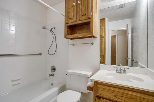 6417 Winifred Dr, Fort Worth, TX 76133 - full bath featuring vanity, washtub / shower combination, and a textured ceiling