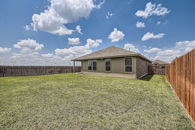 1217 Burlingame Dr, Cleburne, TX 76033 - back of property featuring roof with shingles