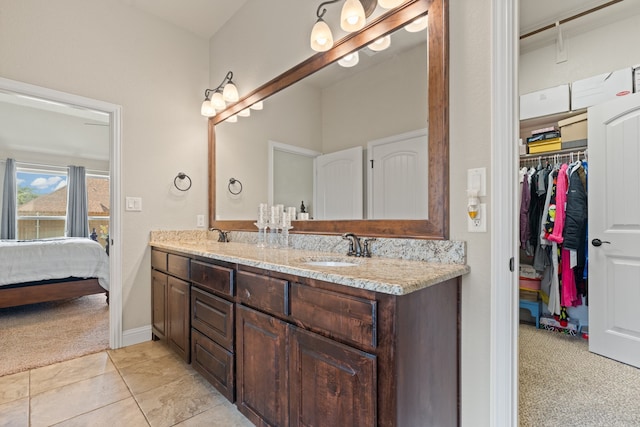 906 Joshua Ct, Granbury, TX 76048 - full bath with ensuite bathroom, double vanity, and a walk in closet