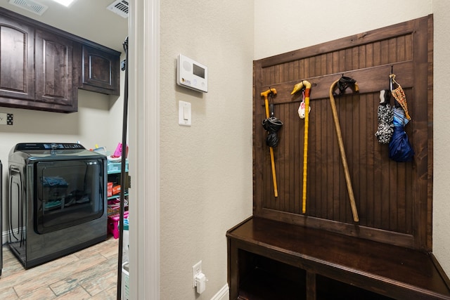 906 Joshua Ct, Granbury, TX 76048 - mudroom featuring a textured wall, light wood finished floors, and baseboards