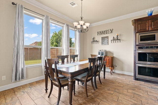 906 Joshua Ct, Granbury, TX 76048 - dining room featuring a chandelier, ornamental molding, baseboards, plenty of natural light, and light wood-type flooring