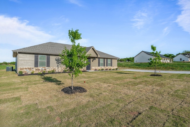 3821 Pine Rd, Poolville, TX 76487 - view of front facade with central air condition unit, a front lawn, and roof with shingles