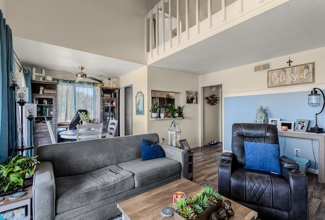 1006 Signal Ridge Pl, Rockwall, TX 75032 - living area featuring wood finished floors, ceiling fan, and baseboards