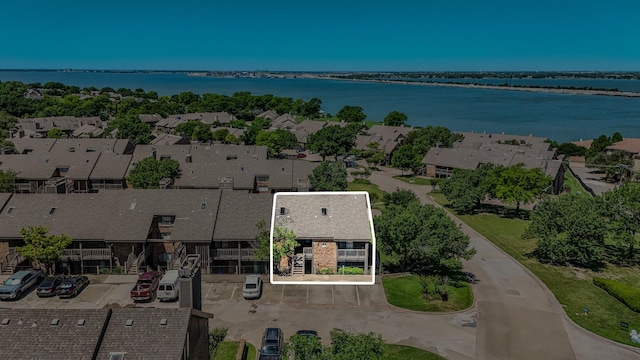 1006 Signal Ridge Pl, Rockwall, TX 75032 - aerial view of residential area featuring property parcel outlined and a nearby body of water