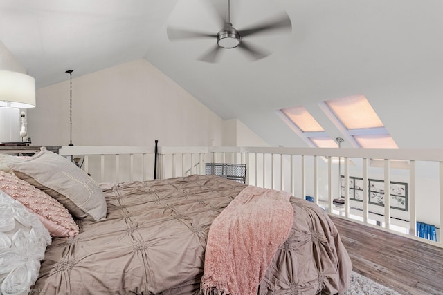 1006 Signal Ridge Pl, Rockwall, TX 75032 - bedroom featuring lofted ceiling, wood finished floors, a skylight, and a ceiling fan