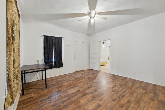 2610 Columbus Ave, Fort Worth, TX 76164 - empty room with ceiling fan, wood finished floors, baseboards, and a textured ceiling