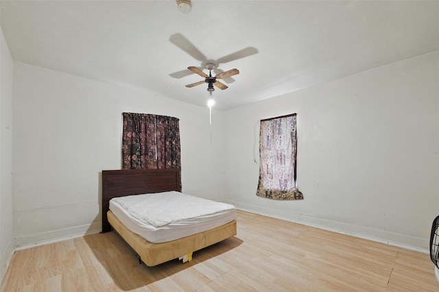 2610 Columbus Ave, Fort Worth, TX 76164 - bedroom with light wood-type flooring, baseboards, and ceiling fan