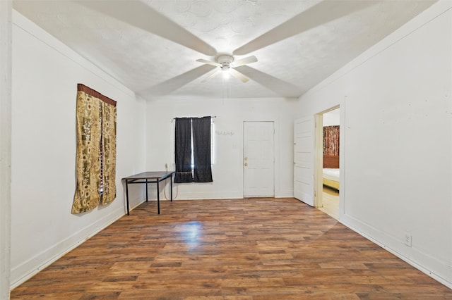 2610 Columbus Ave, Fort Worth, TX 76164 - empty room featuring ceiling fan, wood finished floors, and baseboards
