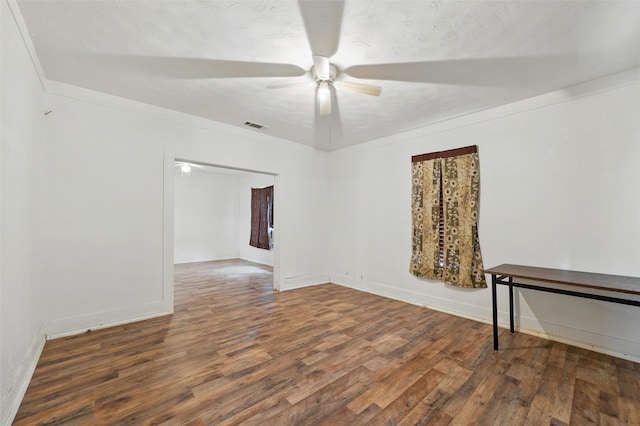 2610 Columbus Ave, Fort Worth, TX 76164 - unfurnished room with ceiling fan, wood finished floors, and baseboards