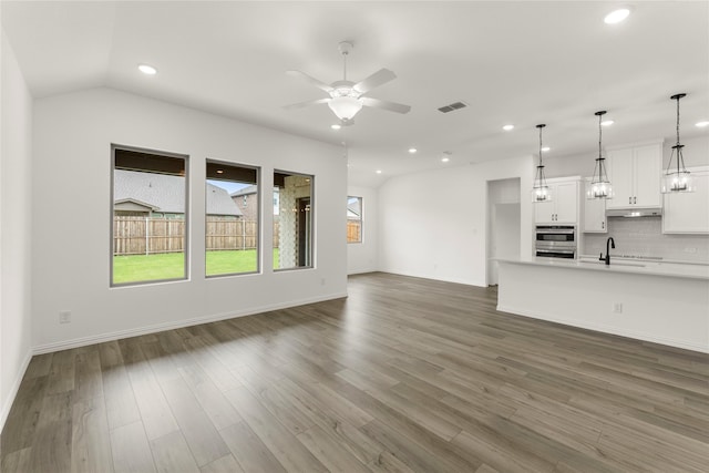 805 Roanoke, Princeton, TX 75407 - unfurnished living room featuring recessed lighting, wood finished floors, and a ceiling fan