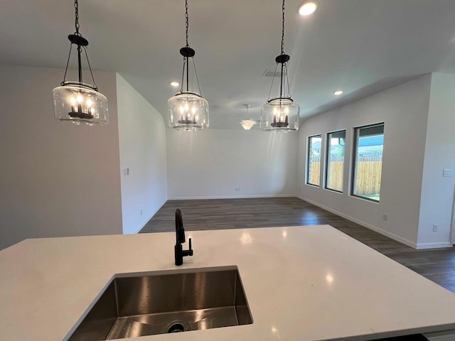 805 Roanoke, Princeton, TX 75407 - kitchen featuring a sink, recessed lighting, dark wood finished floors, light countertops, and decorative light fixtures