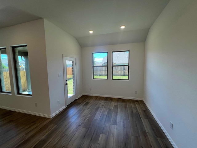 805 Roanoke, Princeton, TX 75407 - empty room with dark wood-style floors, vaulted ceiling, baseboards, and recessed lighting