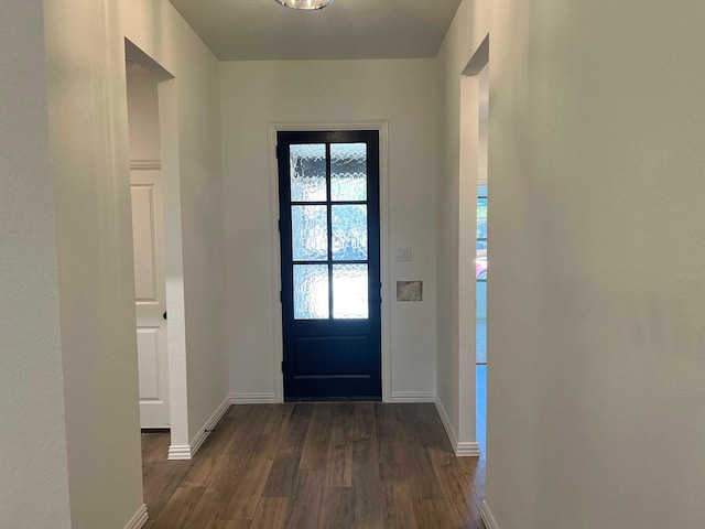 805 Roanoke, Princeton, TX 75407 - doorway featuring dark wood-type flooring and baseboards