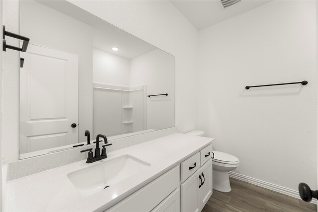 805 Roanoke, Princeton, TX 75407 - bathroom with wood finished floors, vanity, and recessed lighting