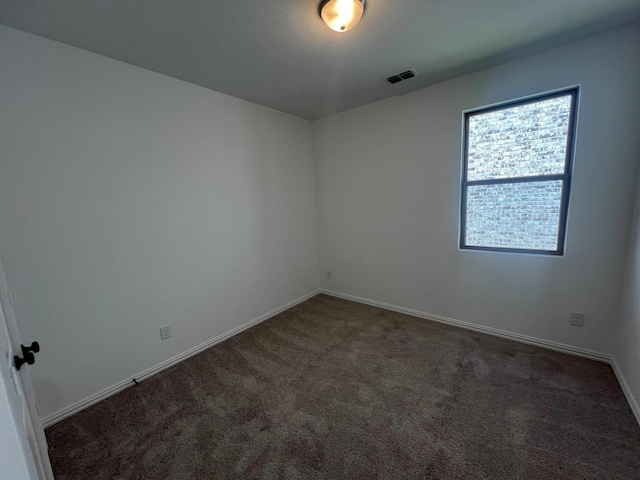 805 Roanoke, Princeton, TX 75407 - carpeted empty room with baseboards