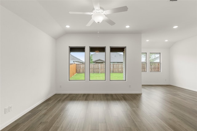 805 Roanoke, Princeton, TX 75407 - spare room with dark wood finished floors, recessed lighting, ceiling fan, and vaulted ceiling