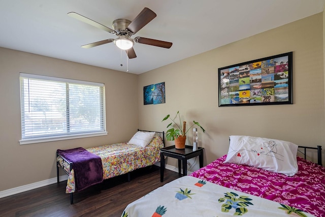 1019 Patricia Dr, Sherman, TX 75090 - bedroom featuring wood finished floors, baseboards, and a ceiling fan
