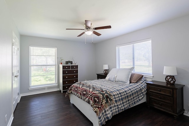 1019 Patricia Dr, Sherman, TX 75090 - bedroom with dark wood finished floors, baseboards, and ceiling fan