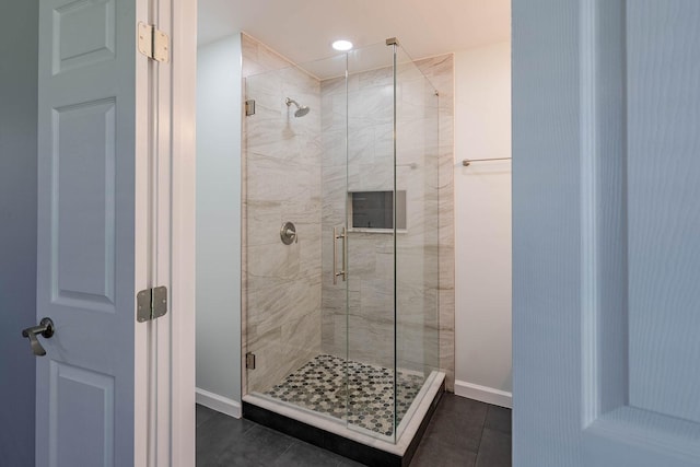 1019 Patricia Dr, Sherman, TX 75090 - bathroom featuring a shower stall, tile patterned flooring, baseboards, and recessed lighting