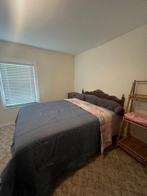 218 Wight St, Roxton, TX 75477 - carpeted bedroom with baseboards