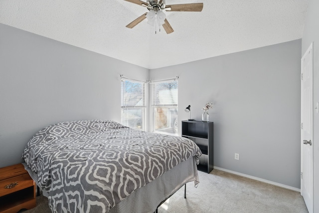 1512 Pacific Pl, Fort Worth, TX 76112 - bedroom featuring carpet floors, a ceiling fan, a textured ceiling, and baseboards