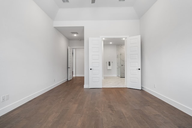 124 Craigmore Dr, Argyle, TX 76226 - unfurnished bedroom featuring dark wood finished floors, baseboards, and connected bathroom