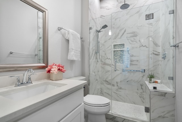 124 Craigmore Dr, Argyle, TX 76226 - bathroom featuring vanity, toilet, and a marble finish shower