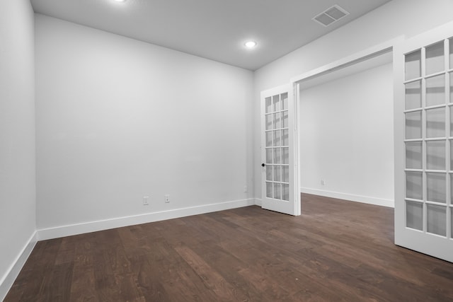 124 Craigmore Dr, Argyle, TX 76226 - empty room featuring french doors, dark wood finished floors, baseboards, and recessed lighting