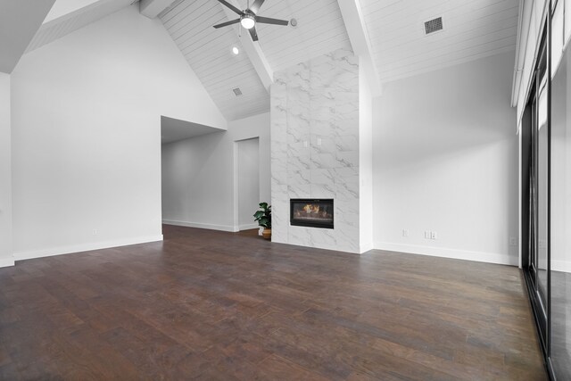 124 Craigmore Dr, Argyle, TX 76226 - unfurnished living room with ceiling fan, high vaulted ceiling, a premium fireplace, wood finished floors, and baseboards