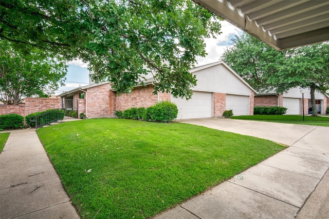 1112 Forest Creek St, Benbrook, TX 76126 - view of front of home with brick siding, a front yard, and a garage