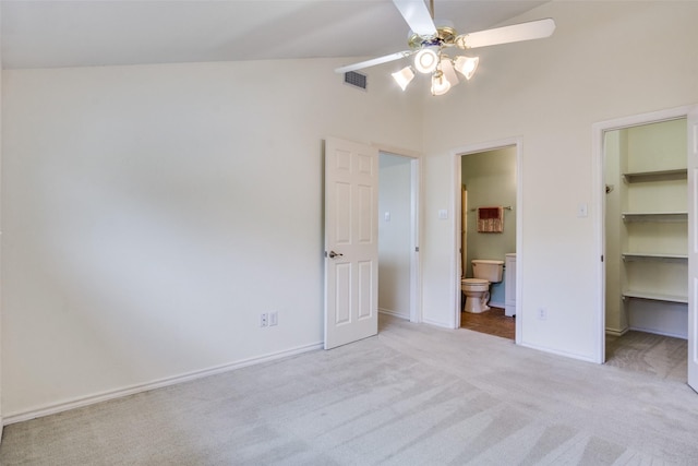 1112 Forest Creek St, Benbrook, TX 76126 - unfurnished bedroom with carpet, a walk in closet, high vaulted ceiling, ensuite bath, and baseboards