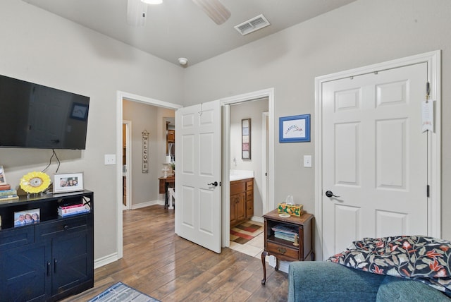 5925 Compass Way, Bluff Dale, TX 76433 - living area with wood finished floors, ceiling fan, and baseboards