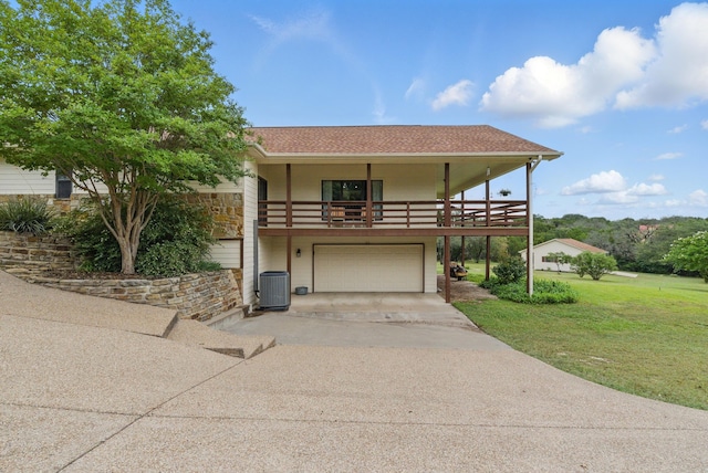 5925 Compass Way, Bluff Dale, TX 76433 - view of front of property with concrete driveway, an attached garage, a front yard, central AC unit, and a shingled roof