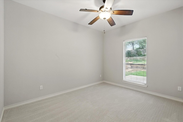 3812 Ridgemont Ln, Denton, TX 76210 - empty room with light colored carpet, baseboards, and a ceiling fan