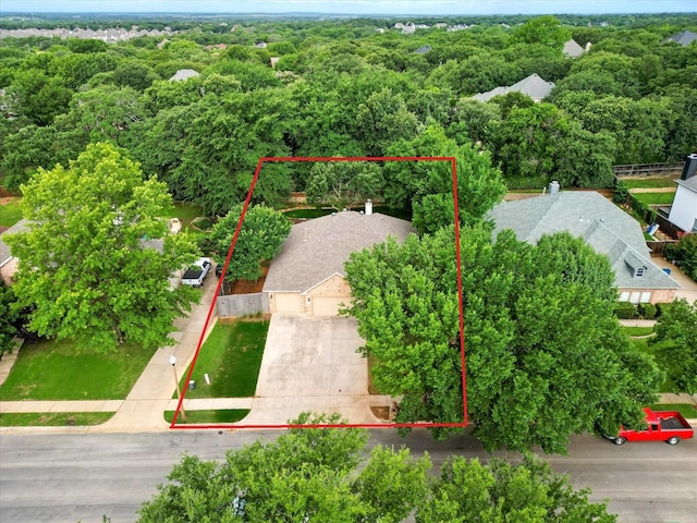 3812 Ridgemont Ln, Denton, TX 76210 - aerial view of property and surrounding area featuring property parcel outlined and a heavily wooded area