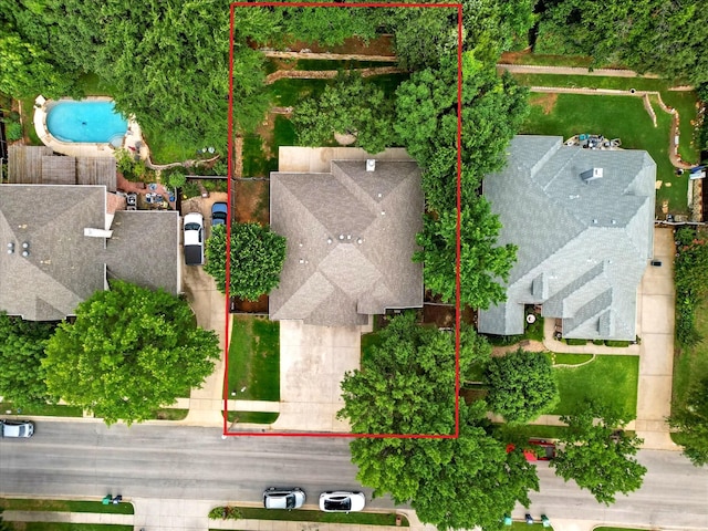 3812 Ridgemont Ln, Denton, TX 76210 - aerial view of property and surrounding area with property parcel outlined and a pool