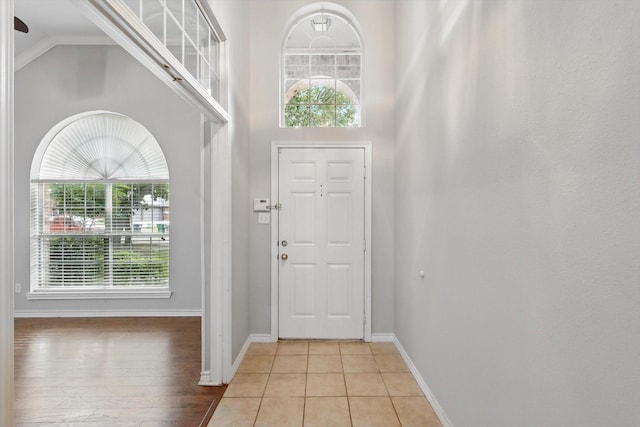 3812 Ridgemont Ln, Denton, TX 76210 - foyer entrance with a towering ceiling and baseboards