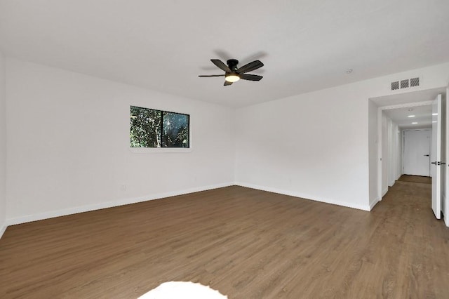 3008 Lindbergh Dr, Dallas, TX 75228 - unfurnished room featuring wood finished floors and a ceiling fan