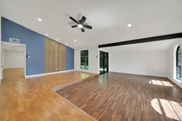 3008 Lindbergh Dr, Dallas, TX 75228 - unfurnished living room with lofted ceiling, wood finished floors, a ceiling fan, and recessed lighting