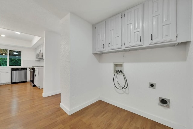 3008 Lindbergh Dr, Dallas, TX 75228 - washroom featuring light wood finished floors, washer hookup, and hookup for an electric dryer