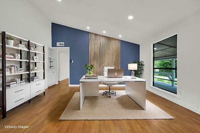 3008 Lindbergh Dr, Dallas, TX 75228 - office space with wood finished floors, high vaulted ceiling, and recessed lighting
