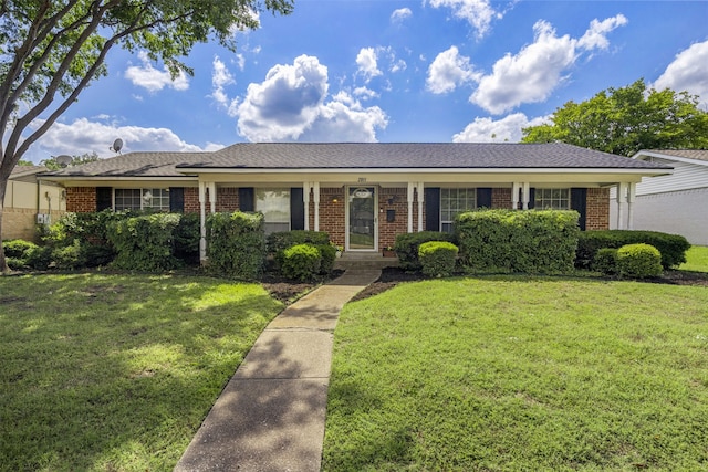 2011 Sandy Trl, Richardson, TX 75080 - single story home featuring brick siding and a front yard