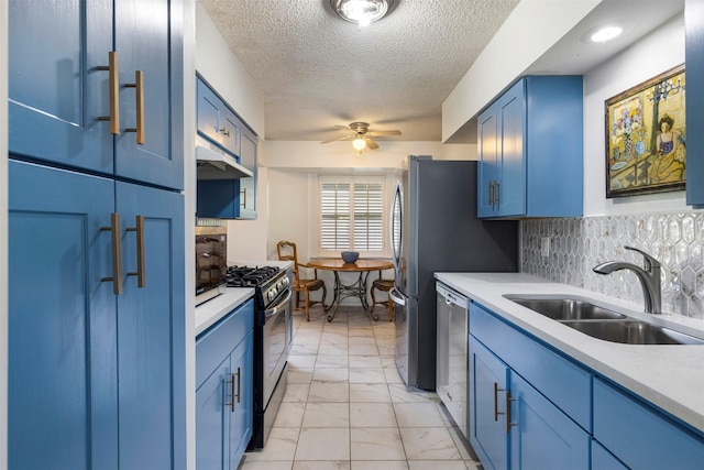 2011 Sandy Trl, Richardson, TX 75080 - kitchen featuring blue cabinets, a sink, stainless steel appliances, light marble finish flooring, and ceiling fan