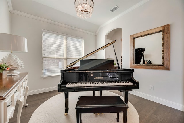11578 Barcelona Ln, Frisco, TX 75035 - living area with ornamental molding, baseboards, arched walkways, wood finished floors, and a chandelier