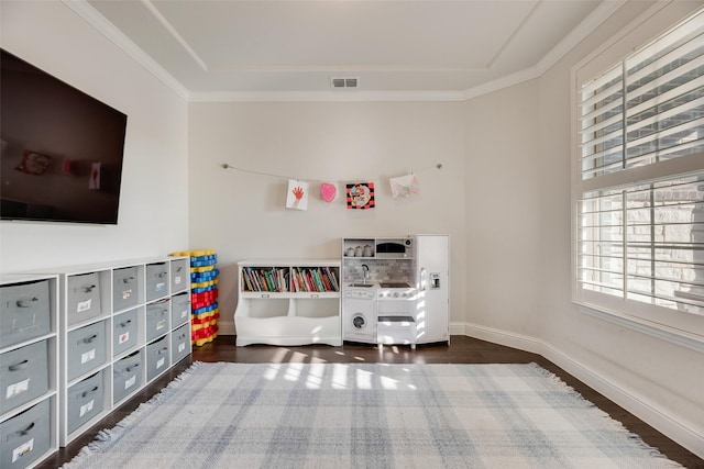 11578 Barcelona Ln, Frisco, TX 75035 - rec room featuring wood finished floors, a tray ceiling, and baseboards